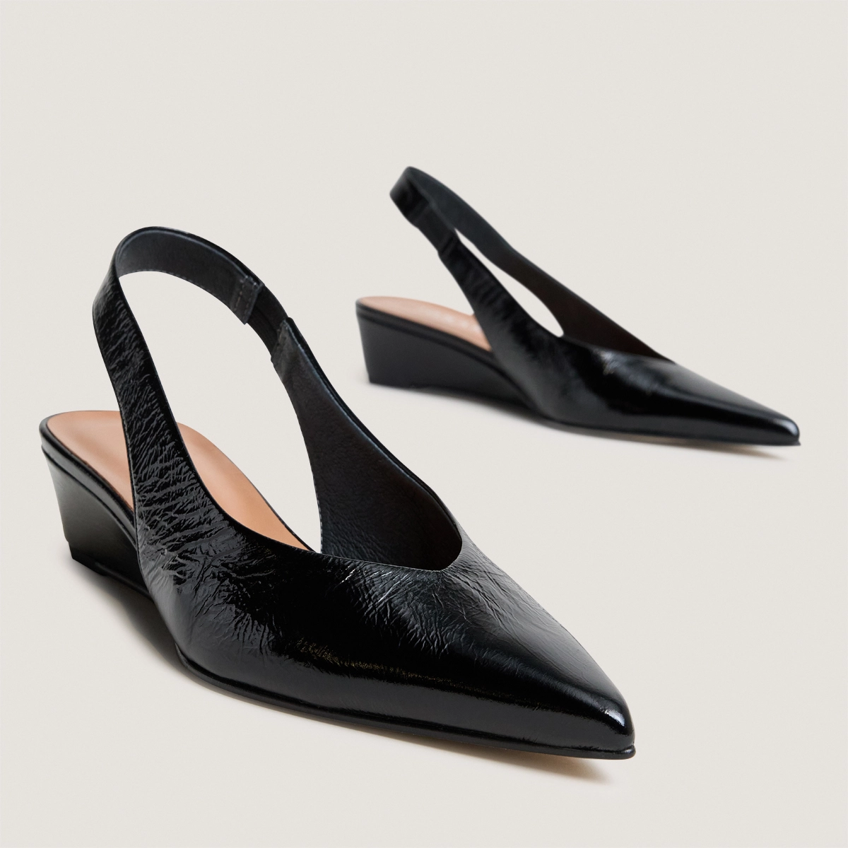 Low-wedge slingback pumps in black shiny leather | DOLEANCE