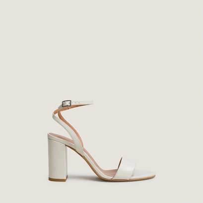 High-heel ankle-strap sandals in ecru aged leather | danger