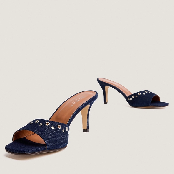 High-heeled studded mules in navy blue jeans | VIVE
