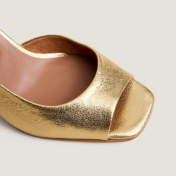 High-heel slingback pumps in gold crackled leather | DIRA
