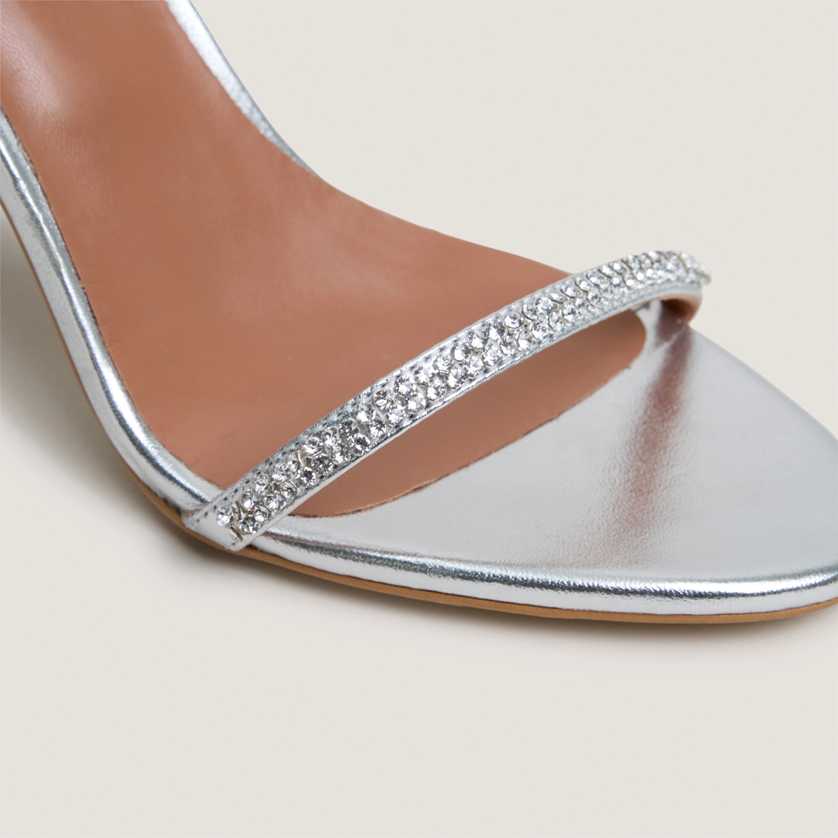 Sandals with slim straps and Swarovski crystals in silver metallic leather | VALLIENCE