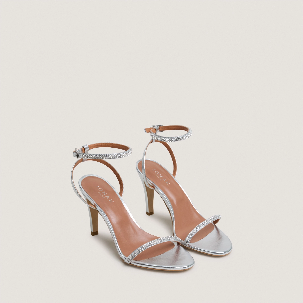 Sandals with slim straps and Swarovski crystals in silver metallic leather | VALLIENCE