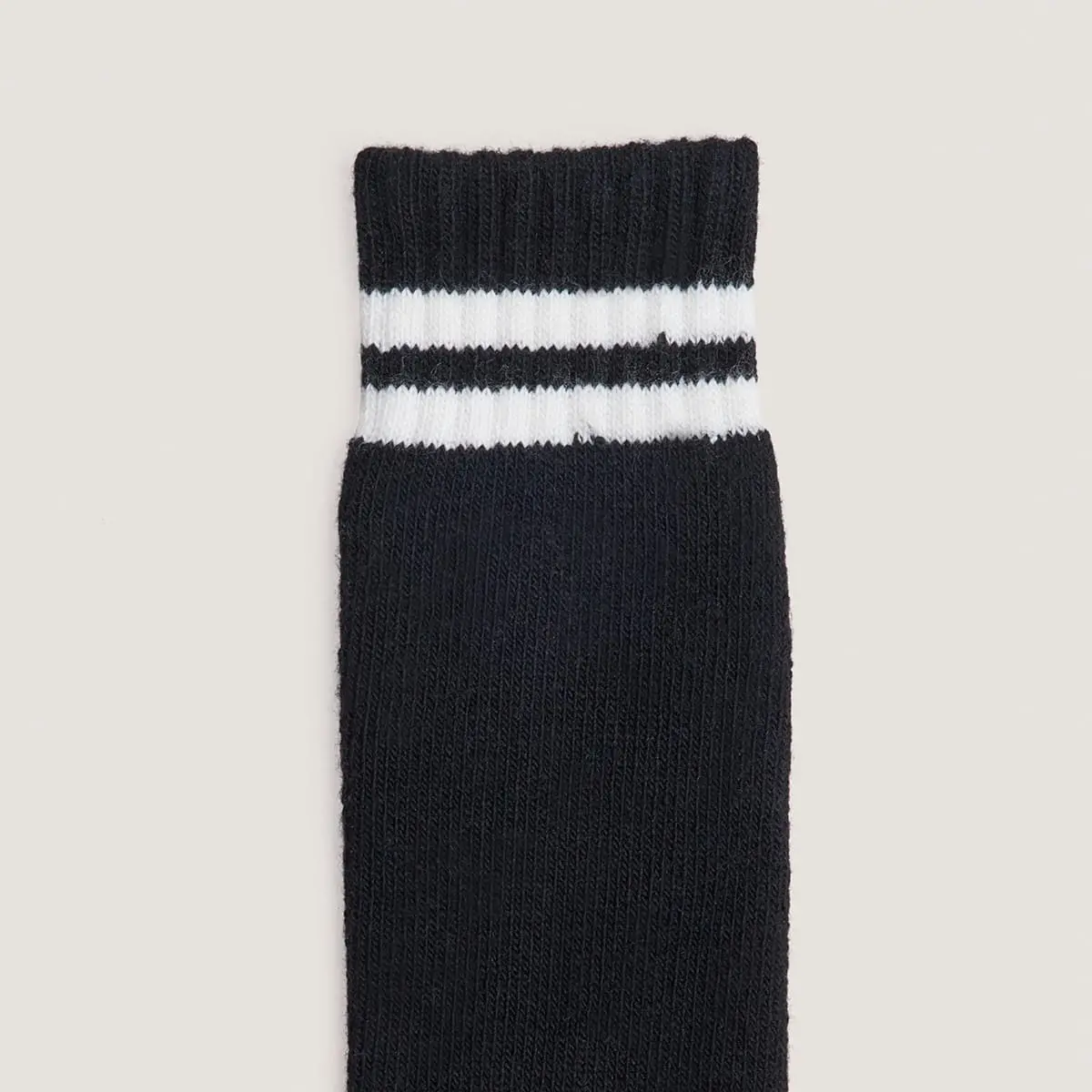 Striped knee-high socks in black and white textile | FELIX