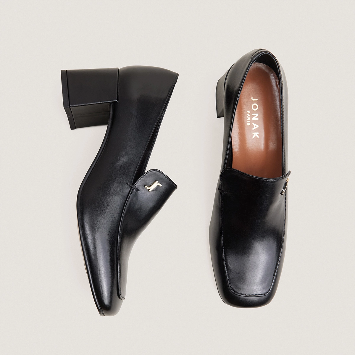Heeled monogram loafers in black leather | VILLETTE
