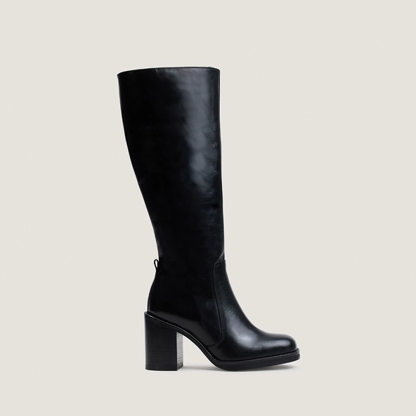 Boots with overflowing heels in black leather | BRETZEL