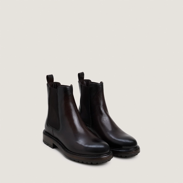 Low boots with elastic and lug soles in dark brown grained leather | CELINA