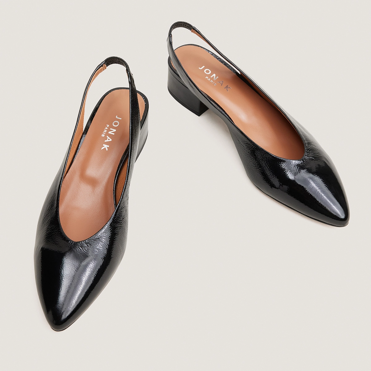 Ballet flats with open backs in black pleated patent leather | VINCE