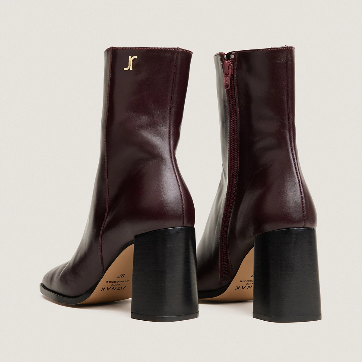 Heeled monogram ankle boots in burgundy leather | VAUBAS