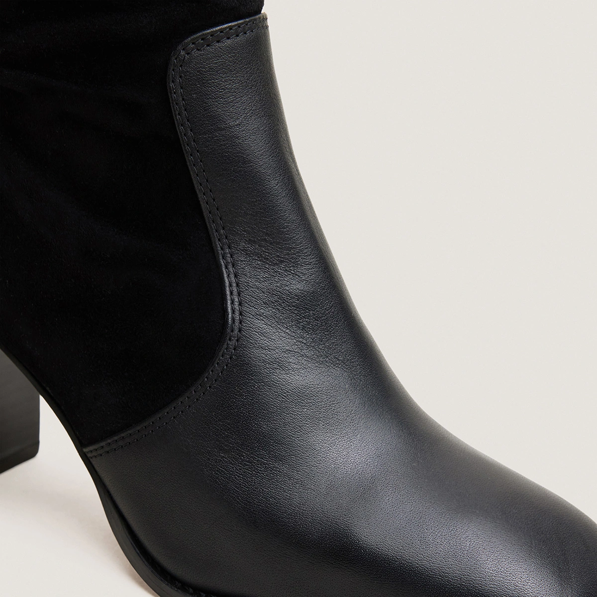 Heeled monogram boots in black leather and black suede | VAUBO