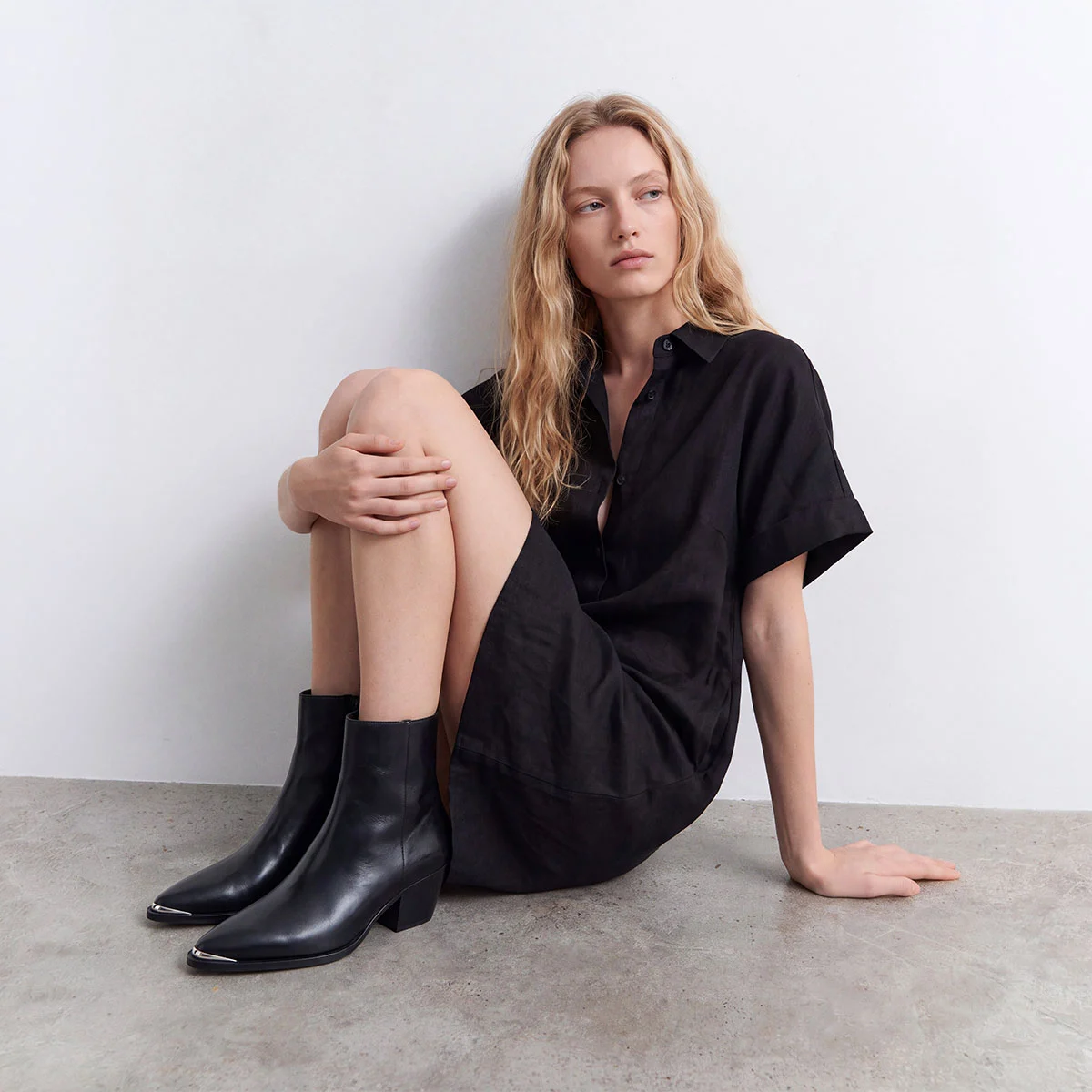 Heeled ankle boots with silver toe caps in black leather | PRUDENCE
