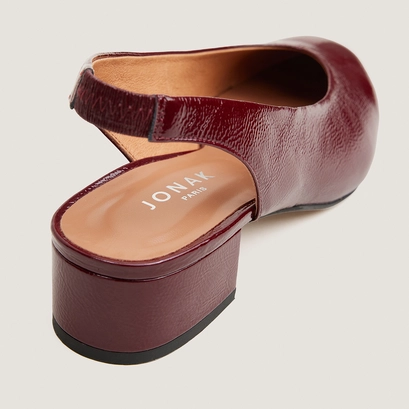 Ballet flats with open backs in burgundy pleated patent leather | vince