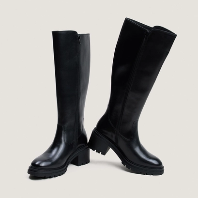 Heeled boots with lug soles black