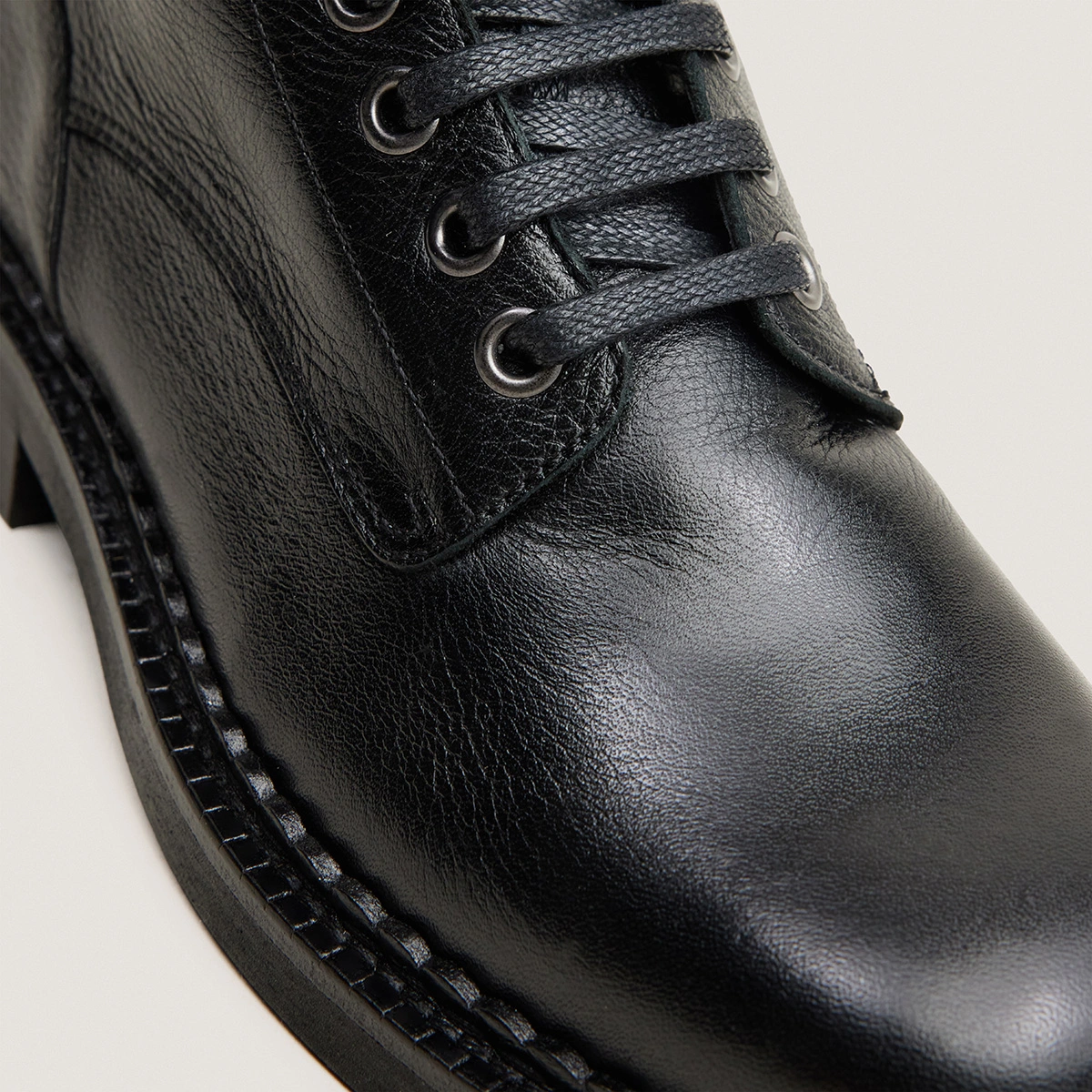 Lace-up heeled ankle boots in black grained leather | DOLL