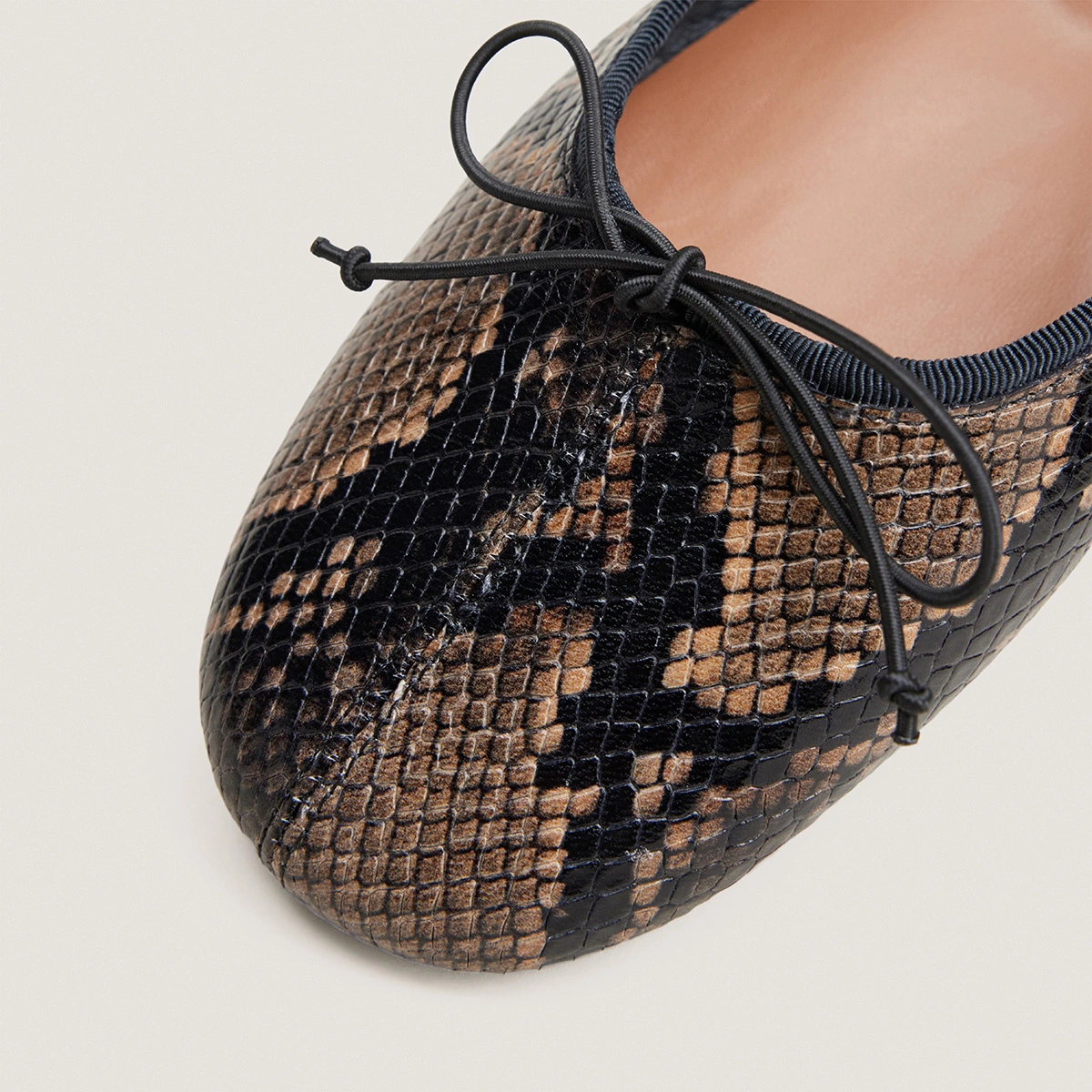 Ballet flats with small laces in taupe python-effect leather | DALLETTE