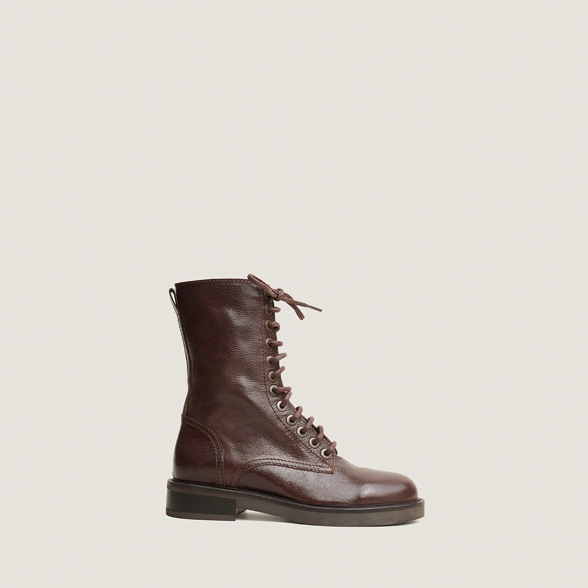 Heeled boots in brown grained leather | APHELIE