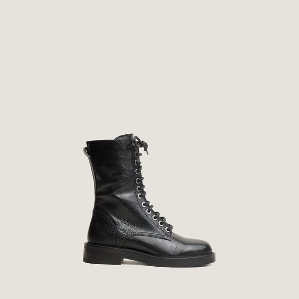 Heeled boots in black grained leather | APHELIE