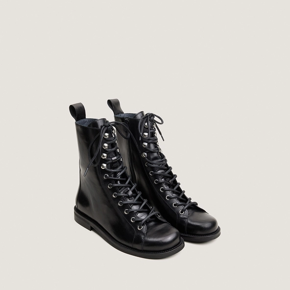 Boots with round toes in black leather | DALIXO