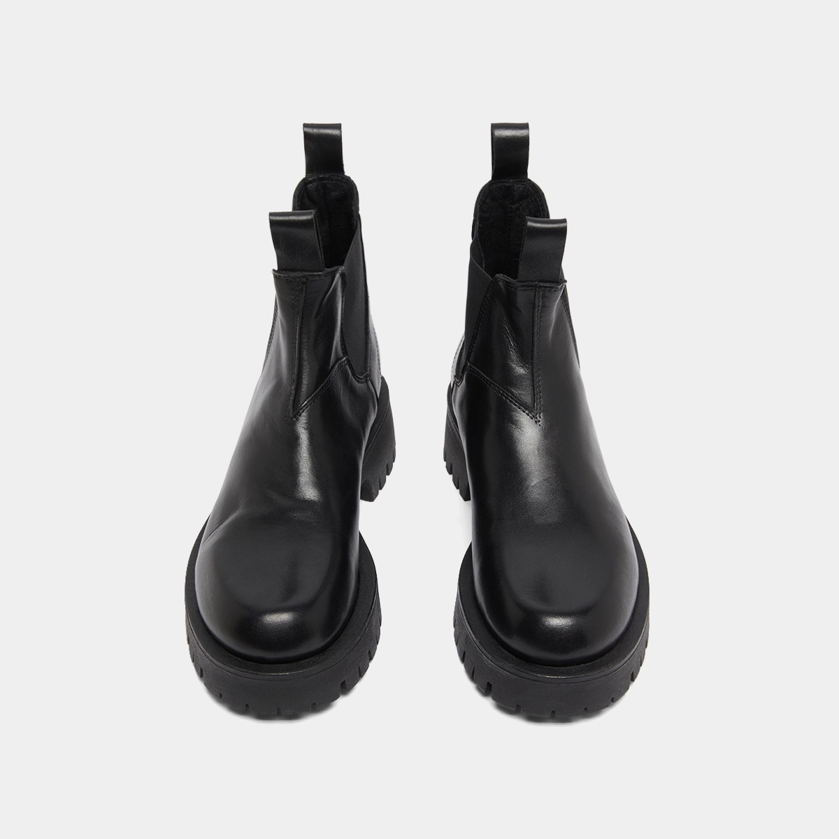 Boots &agrave; semelles crant&eacute;es in black leather | ROCHE