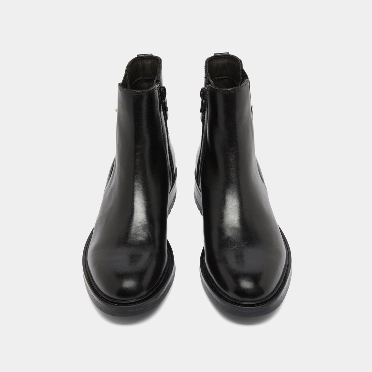 Boots basses &agrave; talons crant&eacute;s in black leather | GABIN