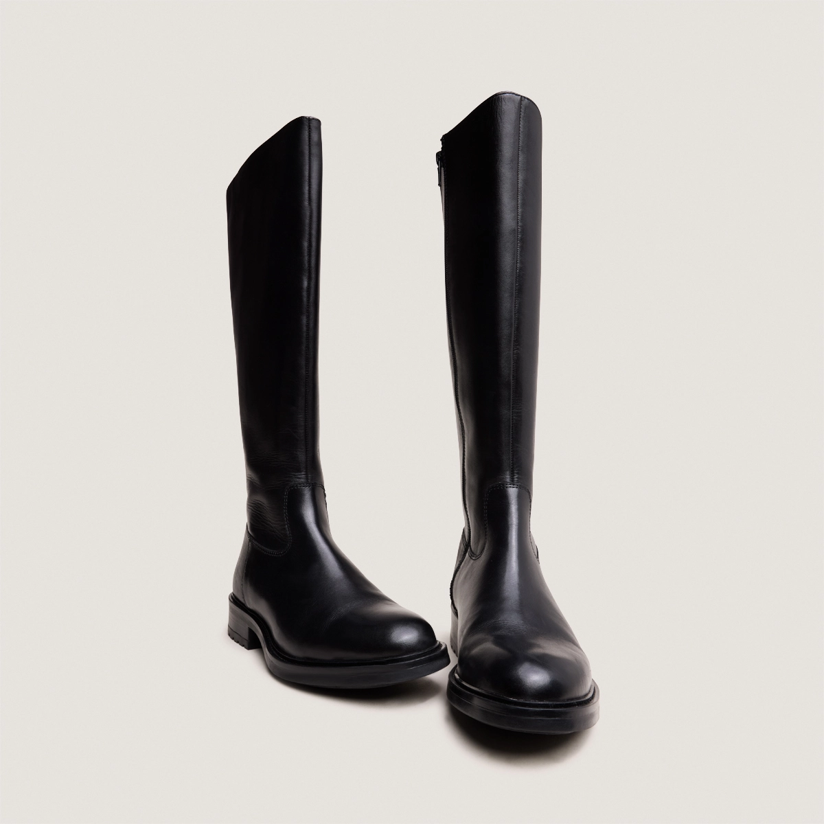 Bottes à talons crantés in black leather | GRACIANA