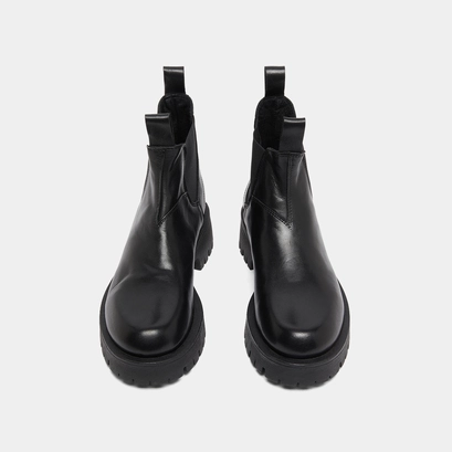 Boots &agrave; semelles crant&eacute;es in black leather | roche