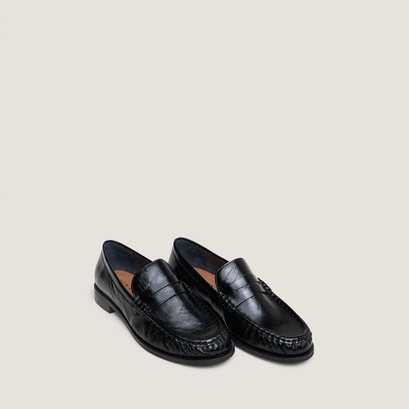 Round-toed loafers in black distressed leather | delice