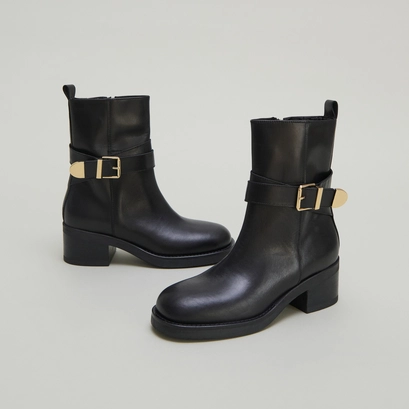 Bottines &agrave; boucles in black leather | ima