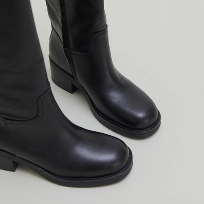 Bottes hautes &agrave; boucles in black leather | irena
