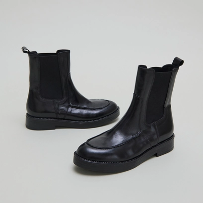Boots &agrave; &eacute;lastiques larges in black leather | allan