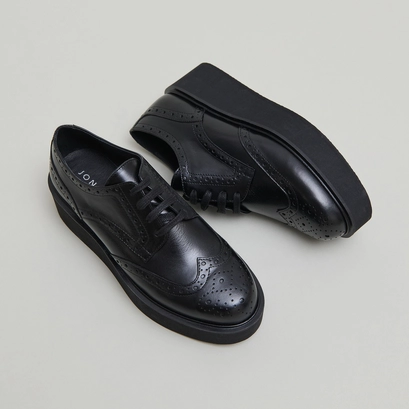 Derbies compens&eacute;es in black leather | adrielle