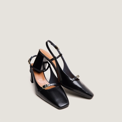 Slingbacks &agrave; talons in black glazed leather | dadelle
