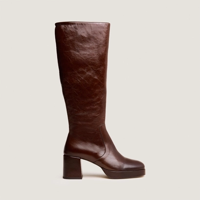 Heeled platform boots in brown distressed leather | vaneo