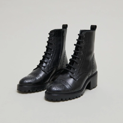 Boots &agrave; lacets et &agrave; talons in black leather | anders