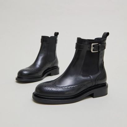 Boots &agrave; boucles in black leather | douby