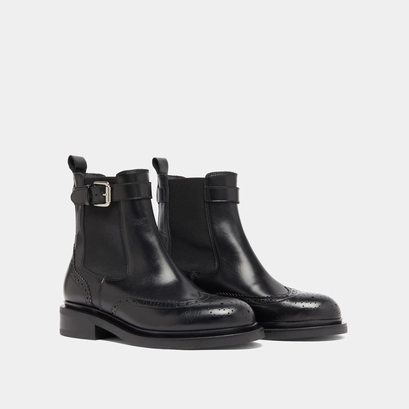Boots &agrave; boucles in black leather | douby