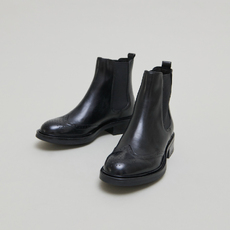 Boots basses &agrave; &eacute;lastiques et d&eacute;tails ajour&eacute;s black