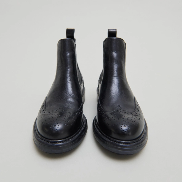Boots à semelles crantées in black leather | CELIA