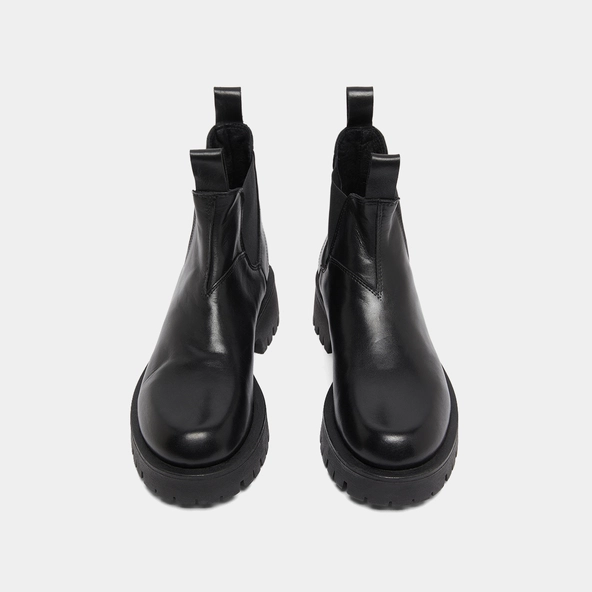 Boots &agrave; semelles crant&eacute;es in black leather | ROCHE