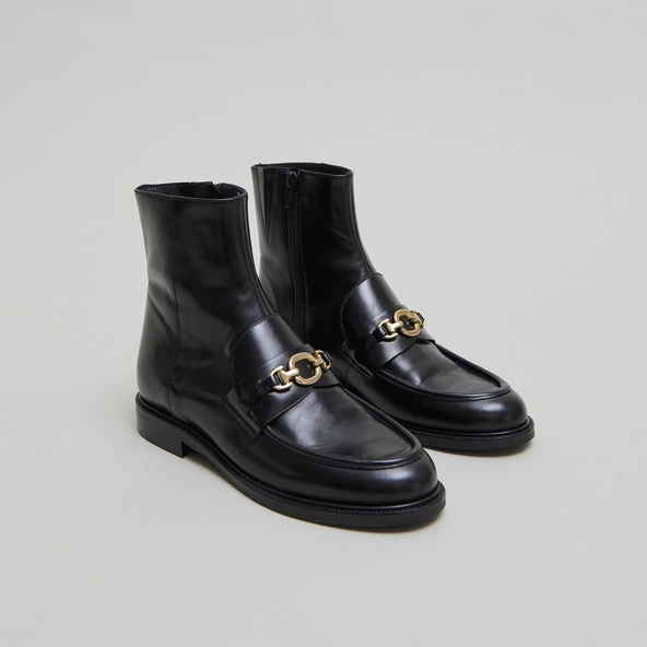 Boots à mors dorés in black leather | DIVOK