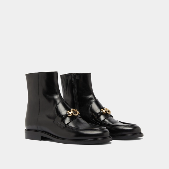 Boots à mors dorés in black leather | DIVOK