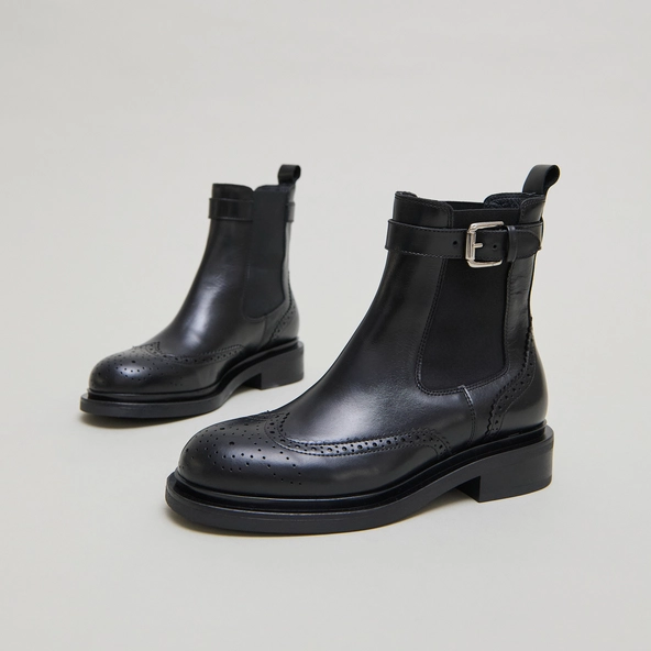 Boots à boucles in black leather | DOUBY