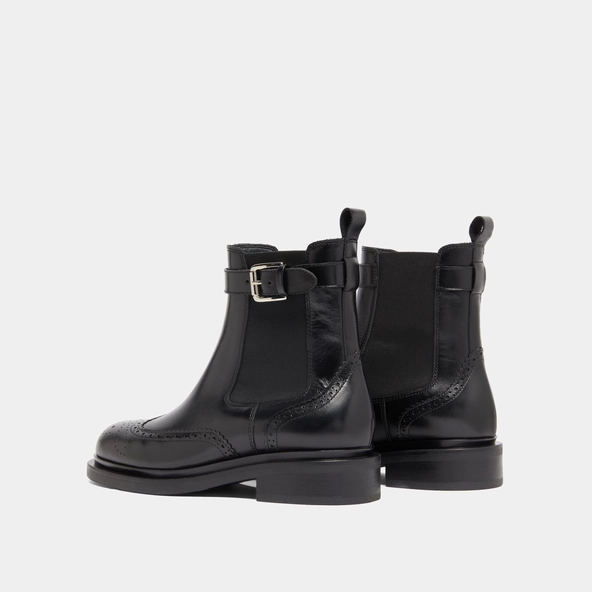 Boots à boucles in black leather | DOUBY