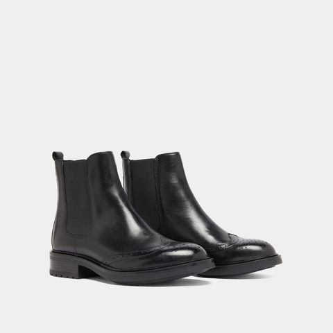 Boots basses &agrave; &eacute;lastiques et d&eacute;tails ajour&eacute;s black