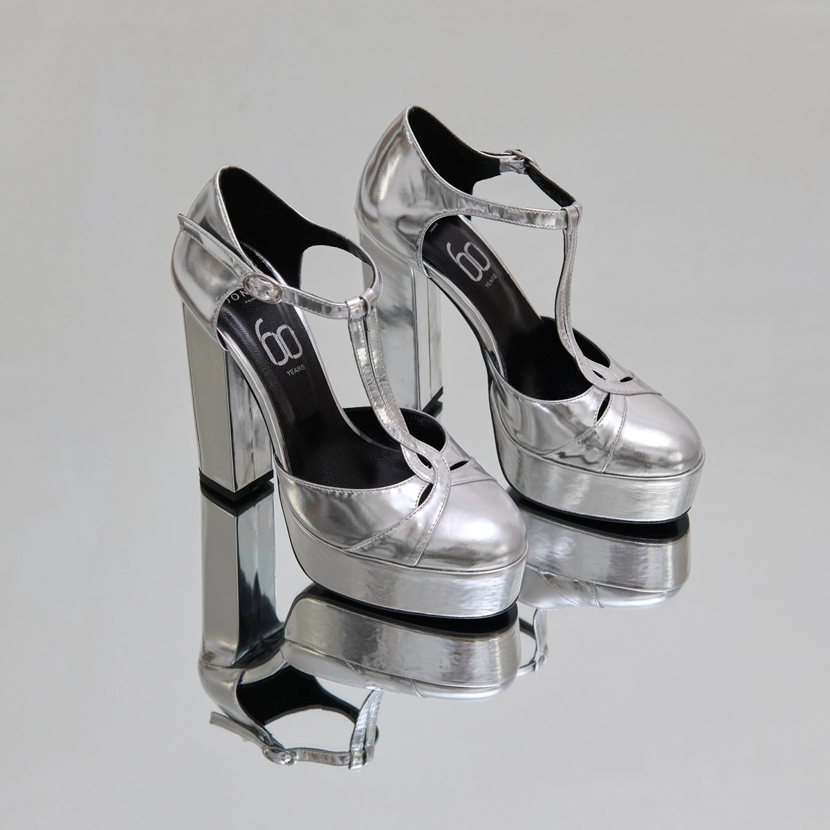 Salomés à talons et plateformes in silver metallic leather | REWIND