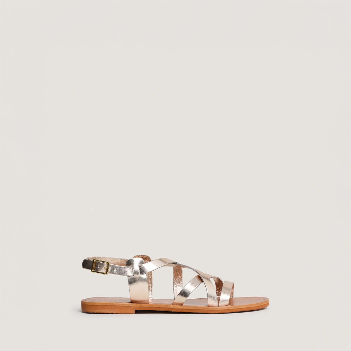 Cross-strap sandals in platinum and cognac metallic leather | WISCHIA