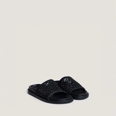 Mules ajour&eacute;es in black leather | wozart