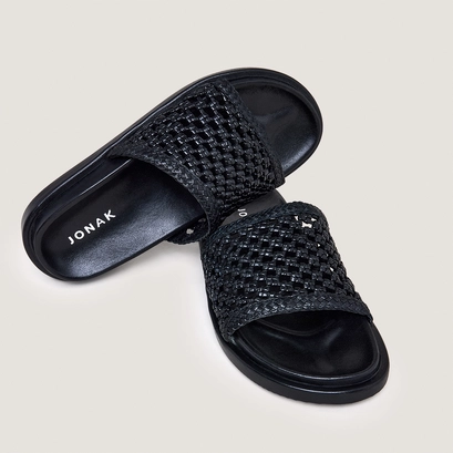 Mules ajour&eacute;es in black leather | wozart
