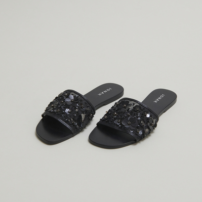 Nu-pieds &agrave; fleurs in black leather and black textile | sun