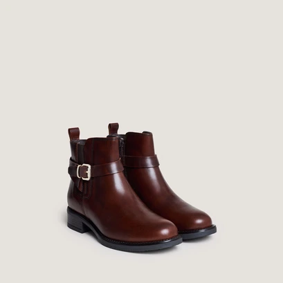 Boots &agrave; boucles in cognac patinated leather | abstrait
