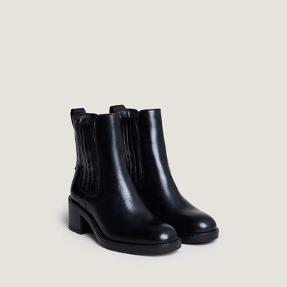 Boots &agrave; talons in black leather | colette